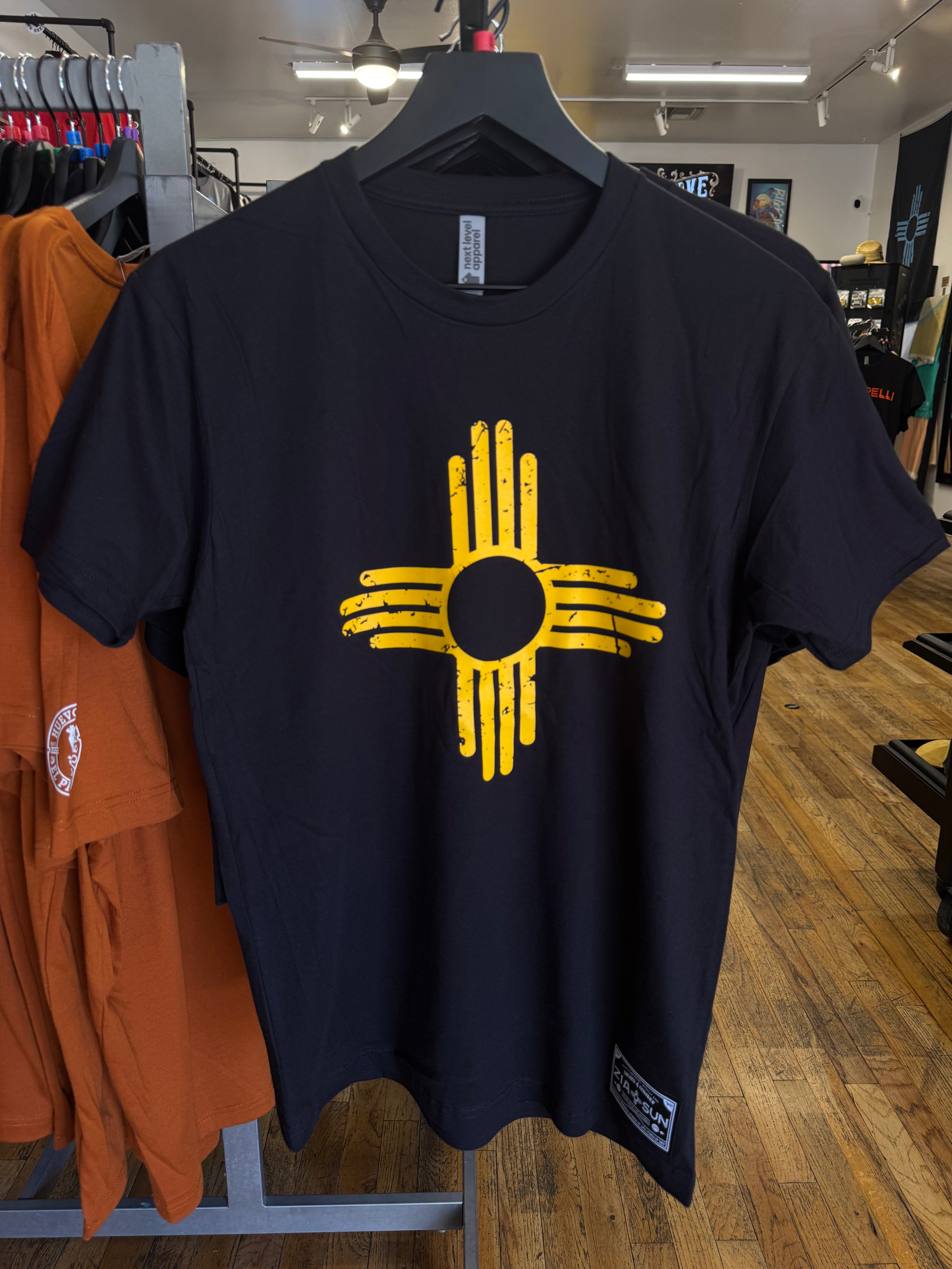 Black with yellow zia